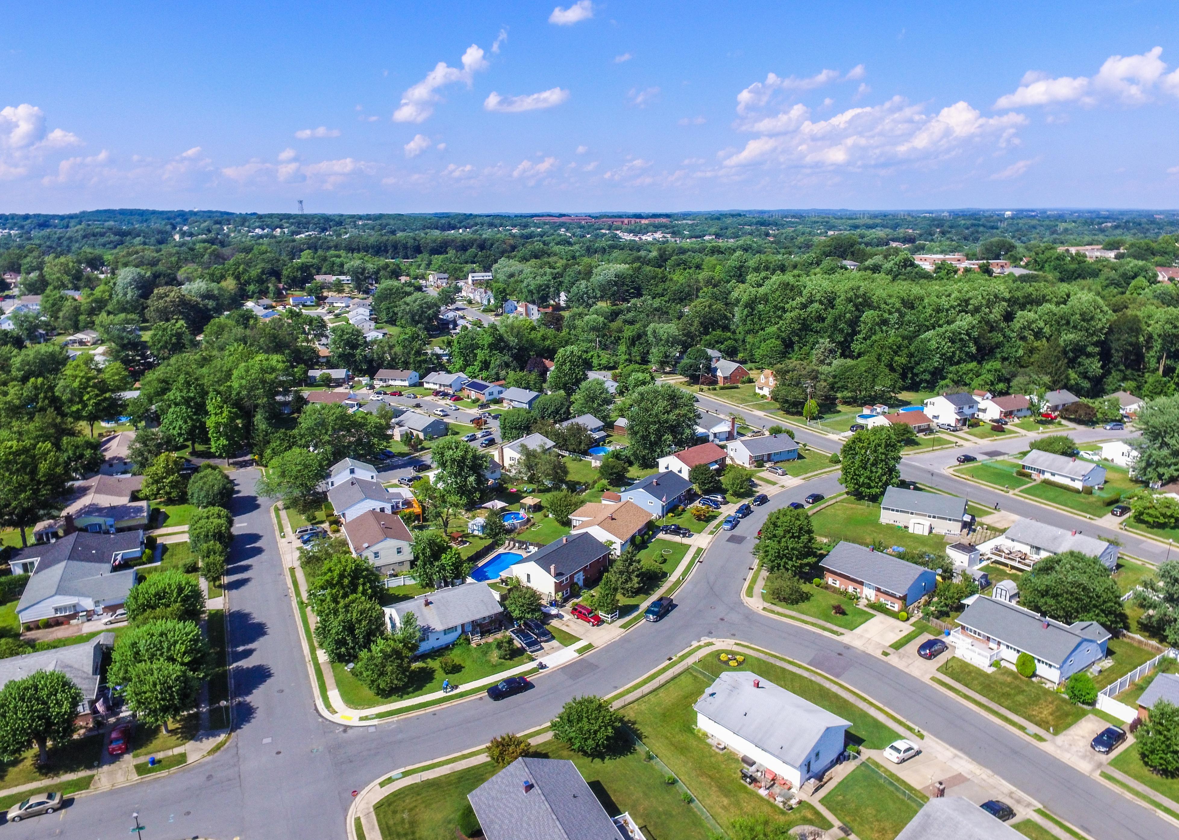 Aerial view of suburban community in summer.