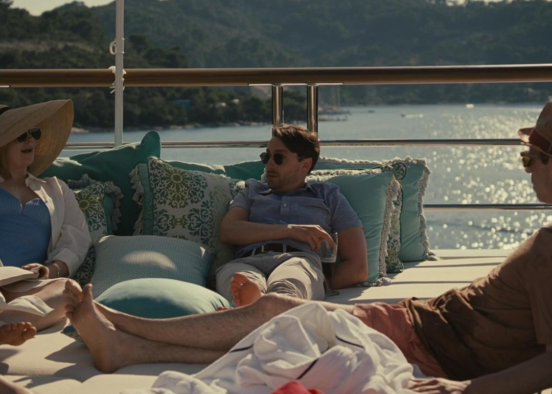 Kieran Culkin, Jeremy Strong, and Sarah Snook relaxing on a yacht.