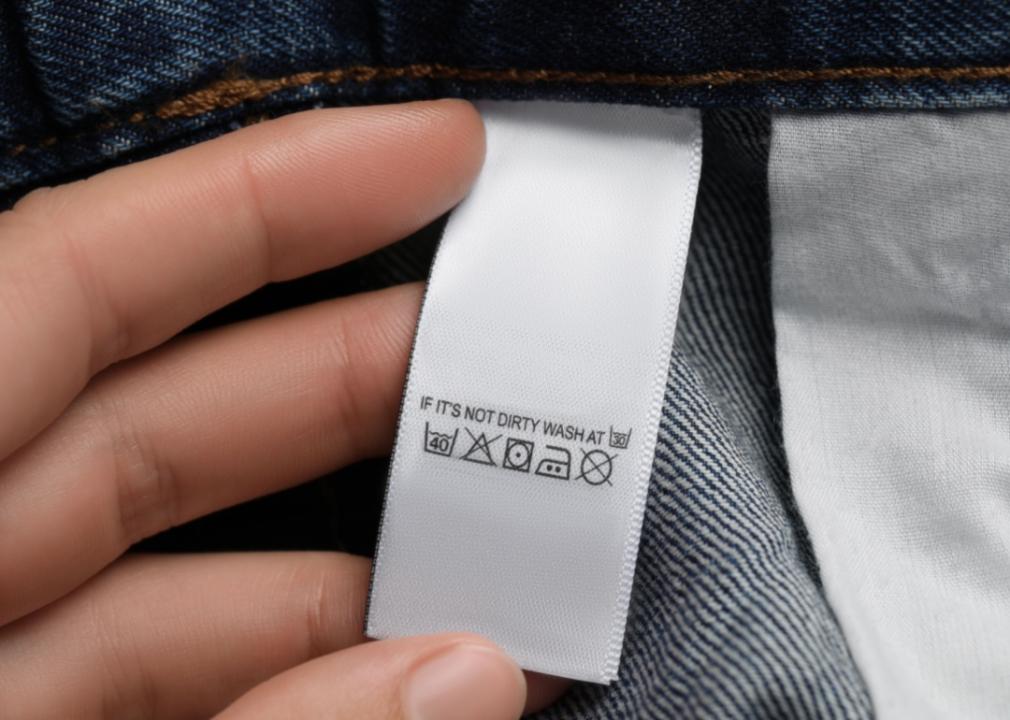 A care label on a pair of blue jeans.