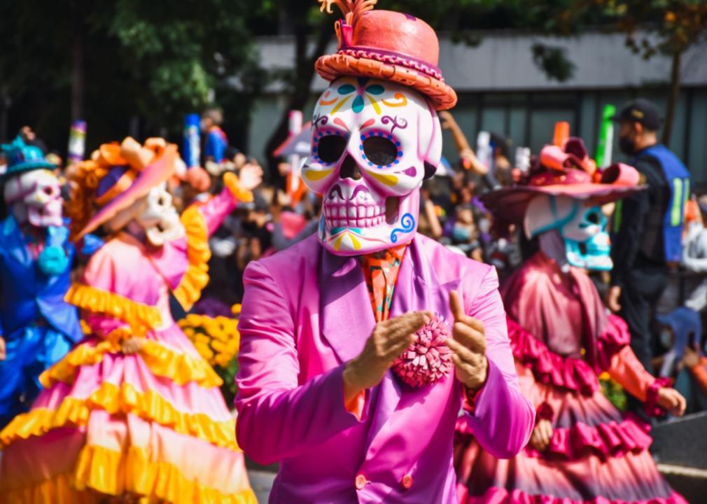 People in Day of the Dead costumes.