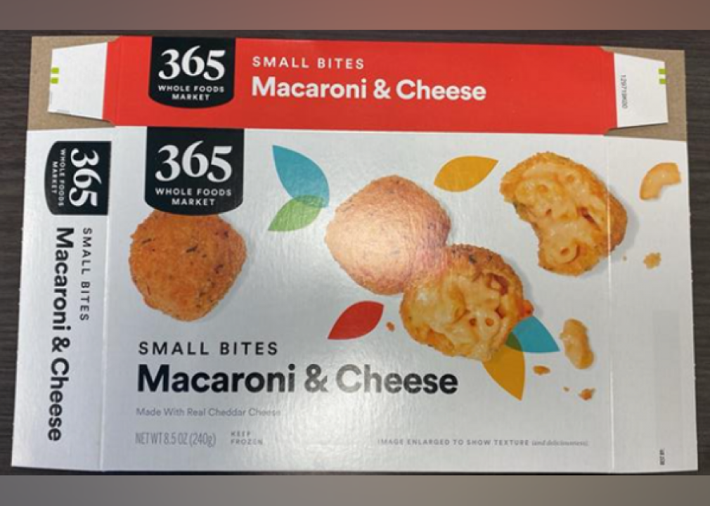 An empty, flattened package of 365 Whole Foods Market Macaroni and cheese bites.