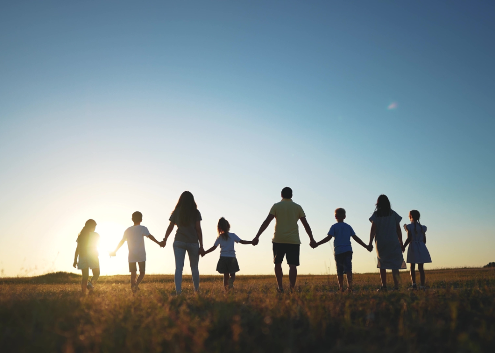 Silhouettes of a big family.