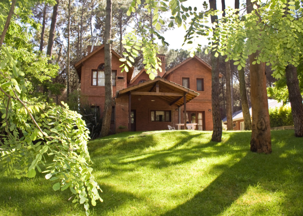 A wood home in the trees.