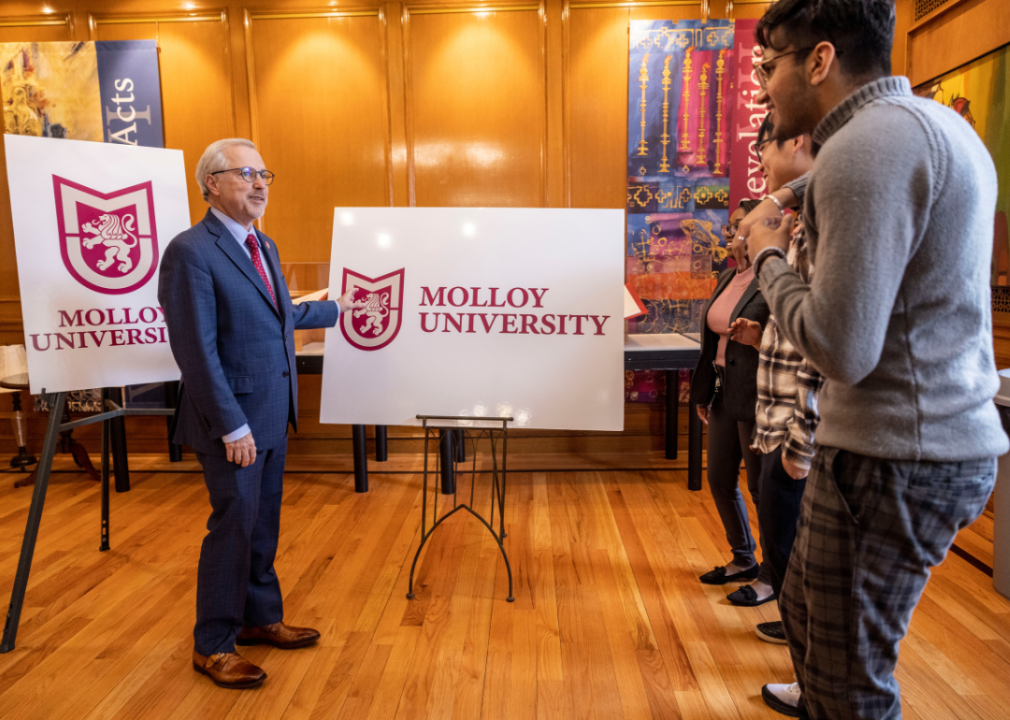 #38. Molloy University Molloy University President and students.