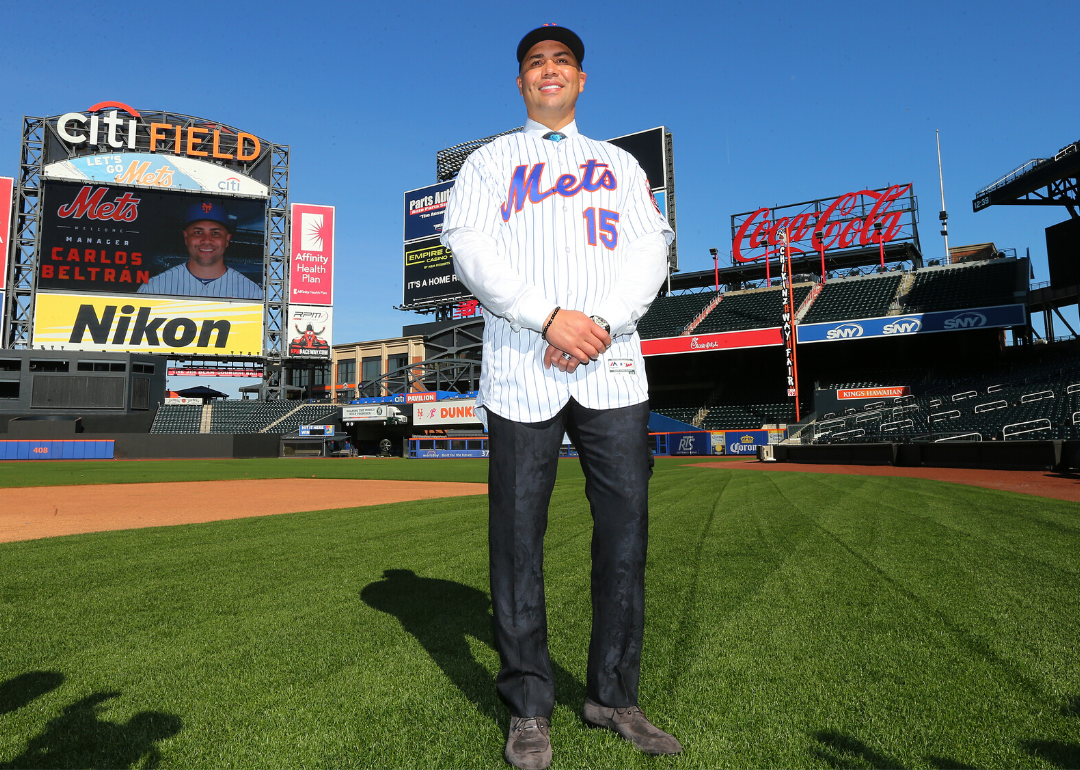 Carlos Beltrán poses for pictures at Citi Field.