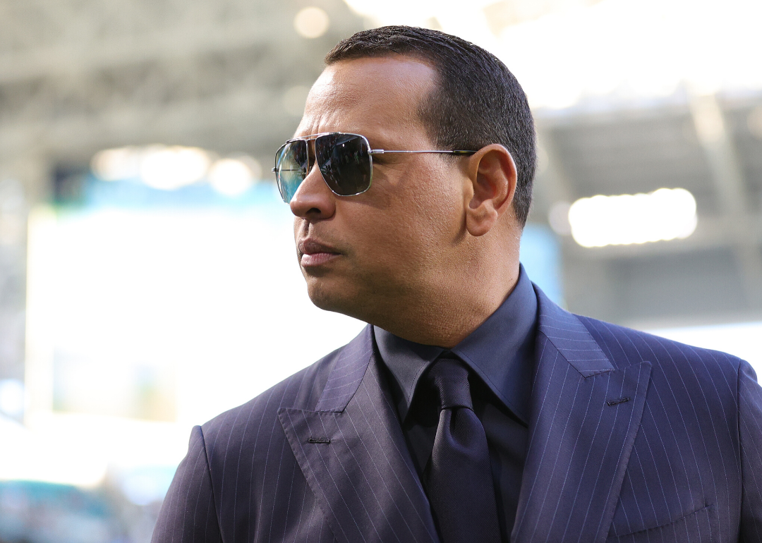Alex Rodriguez dressed up and wearing sunglasses.