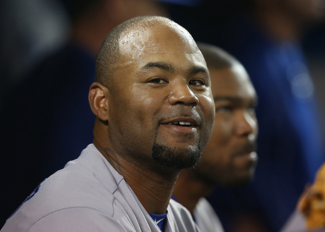 Carl Crawford smiles in the dugout.