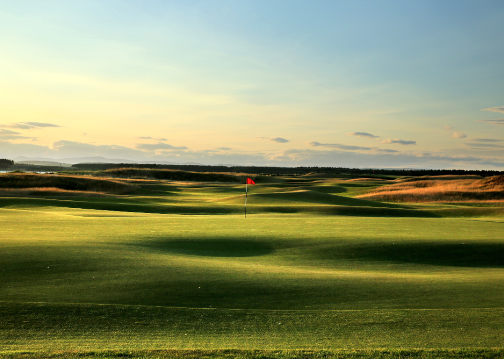 A green hilly golf course.