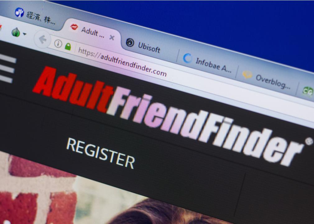 The AdultFriendFinder website on the display of a computer