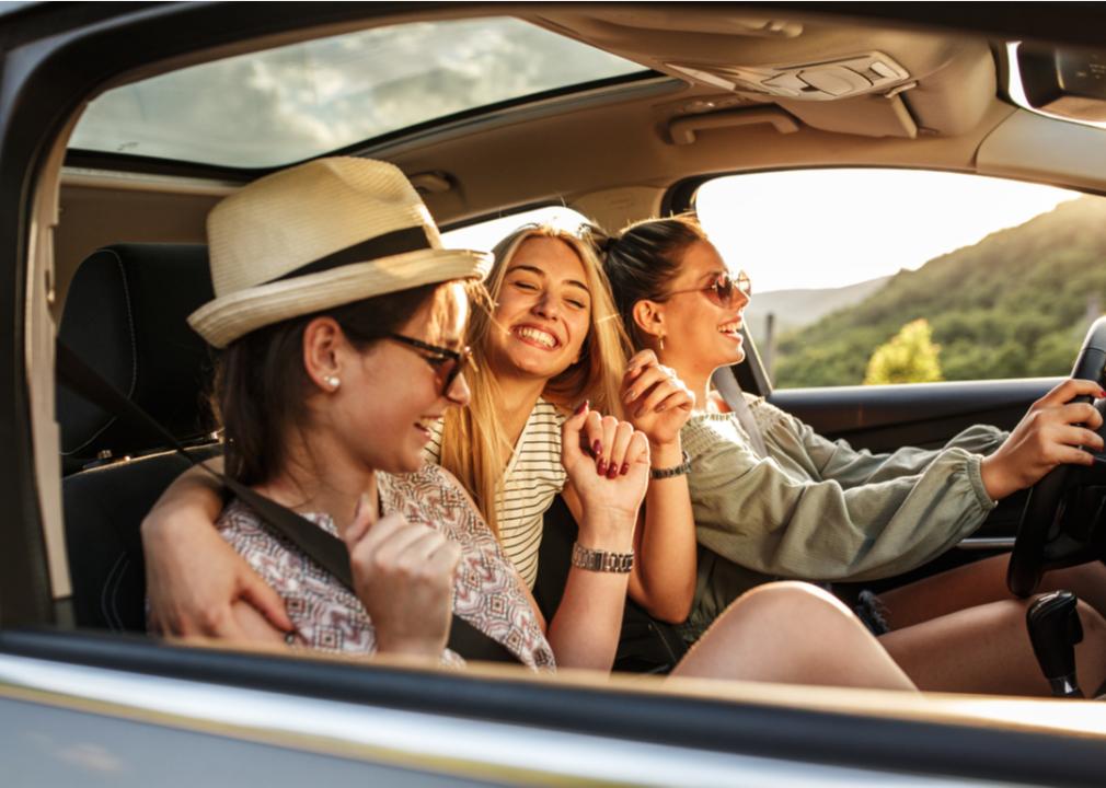 A group of teen girls in a car as one drives