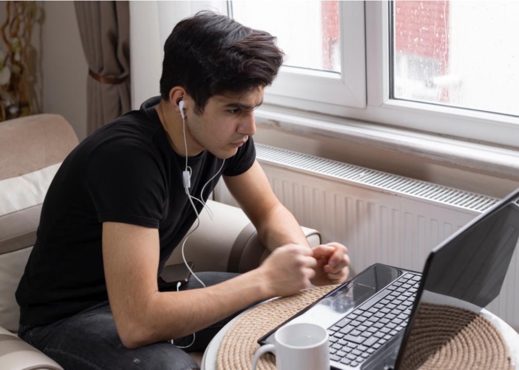 A college student studying at home