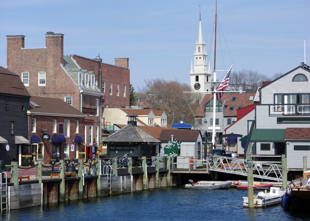 Building, boats, and docks at old harbor in Newport.