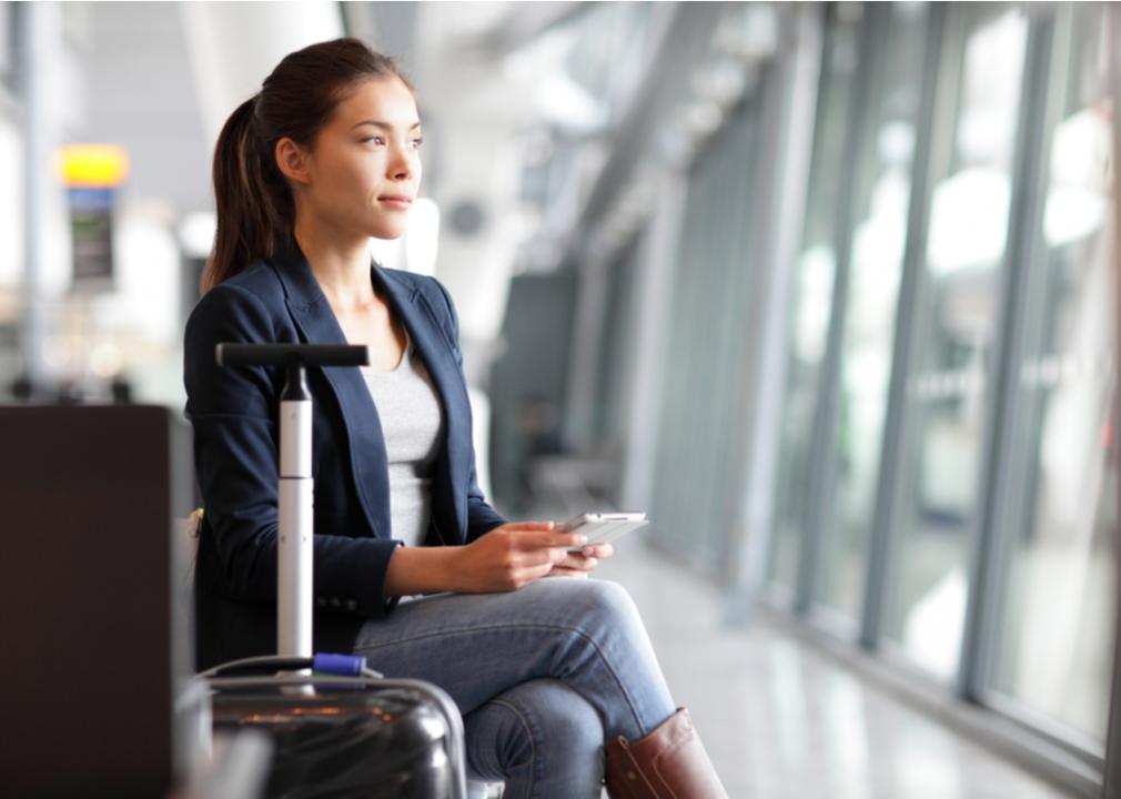 Person working at an airport during business travel