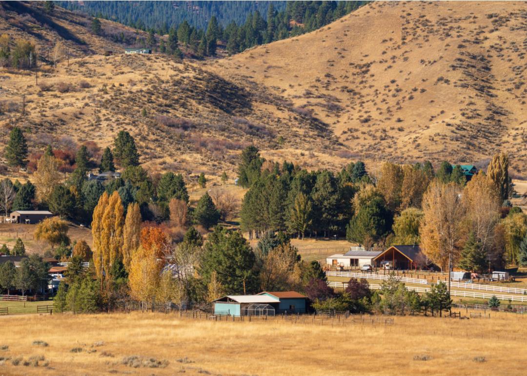An idyllic, rural Idaho homestead amongst rolling hills.
