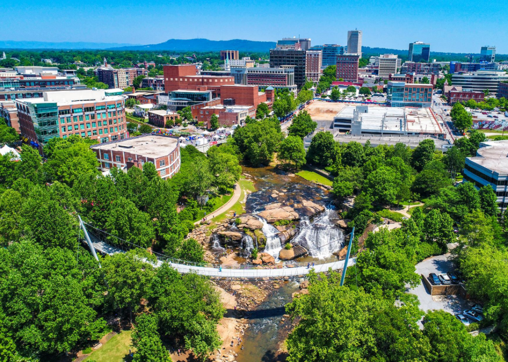 Aerial view cityscape, falls, and park.
