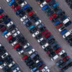 Aerial view of cars lined up for export.