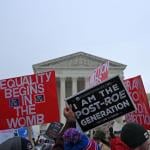 Pro-life activists march in front of the Us Supreme Court during the 49th annual March for Life, on January 21, 2022, in Washington, DC.