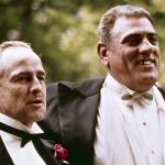 American actors Marlon Brando as Don Vito Corleone and Lenny Montana as Luca Brasi in a scene from 'The Godfather' (directed by Francis Ford Coppola) in New York, New York in 1972.