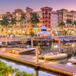 Dock and townhouses at sundown in Naples, Florida.