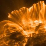 A series of coronal loops extending over the sun’s surface