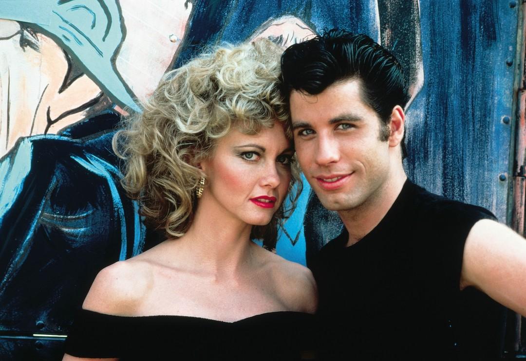 Olivia Newton-John and John Travolta as Sandy and Danny in the final scene of "Grease"