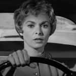 Janet Leigh driving a car as Marion Crane in Alfred Hitchcock's 1960 psychological thriller "Psycho"