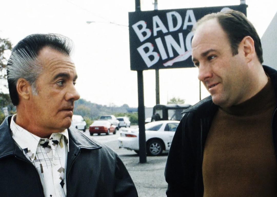 Paulie (Tony Sirico) and Tony (James Gandolfini) stand outside the Bada Bing on "The Sopranos"