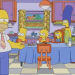 Homer Simpson stands in the kitchen while Bart, Lisa, Maggie, and Grandpa sit at the kitchen table, with Marge standing behind it.