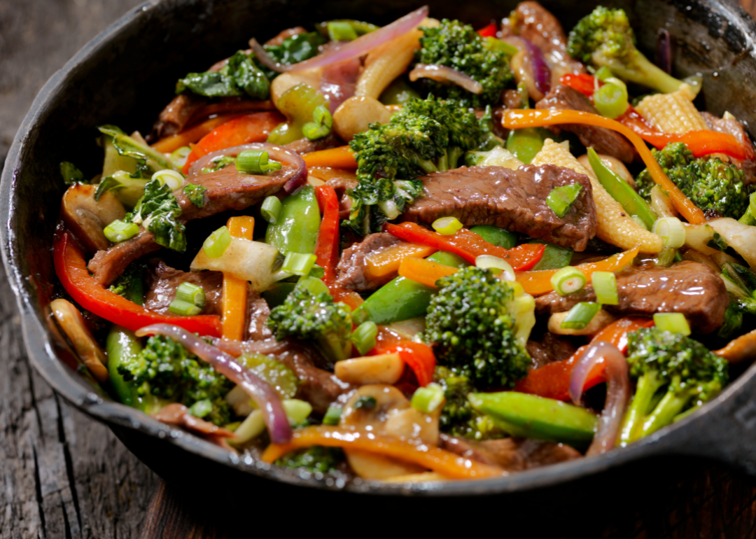 Beef and broccoli stir fry in a pan