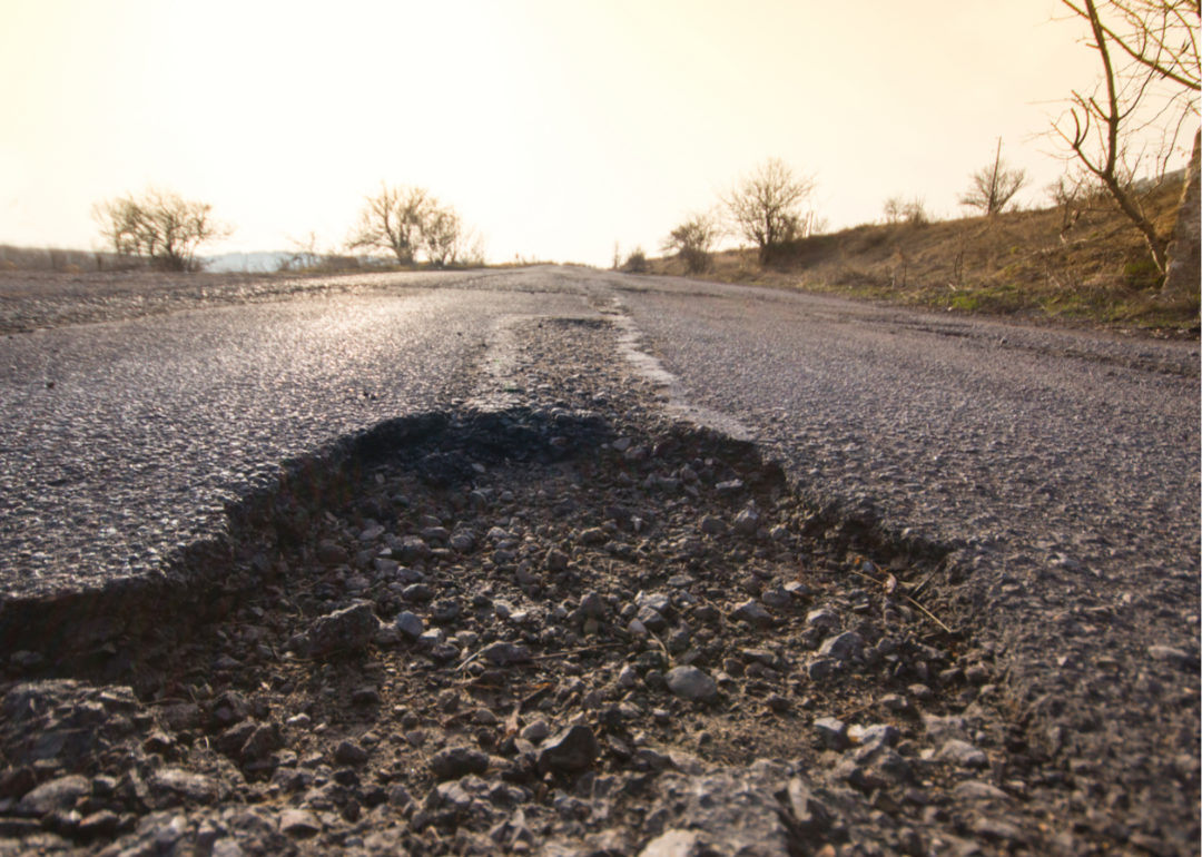 Closeup of a pothole in an open road