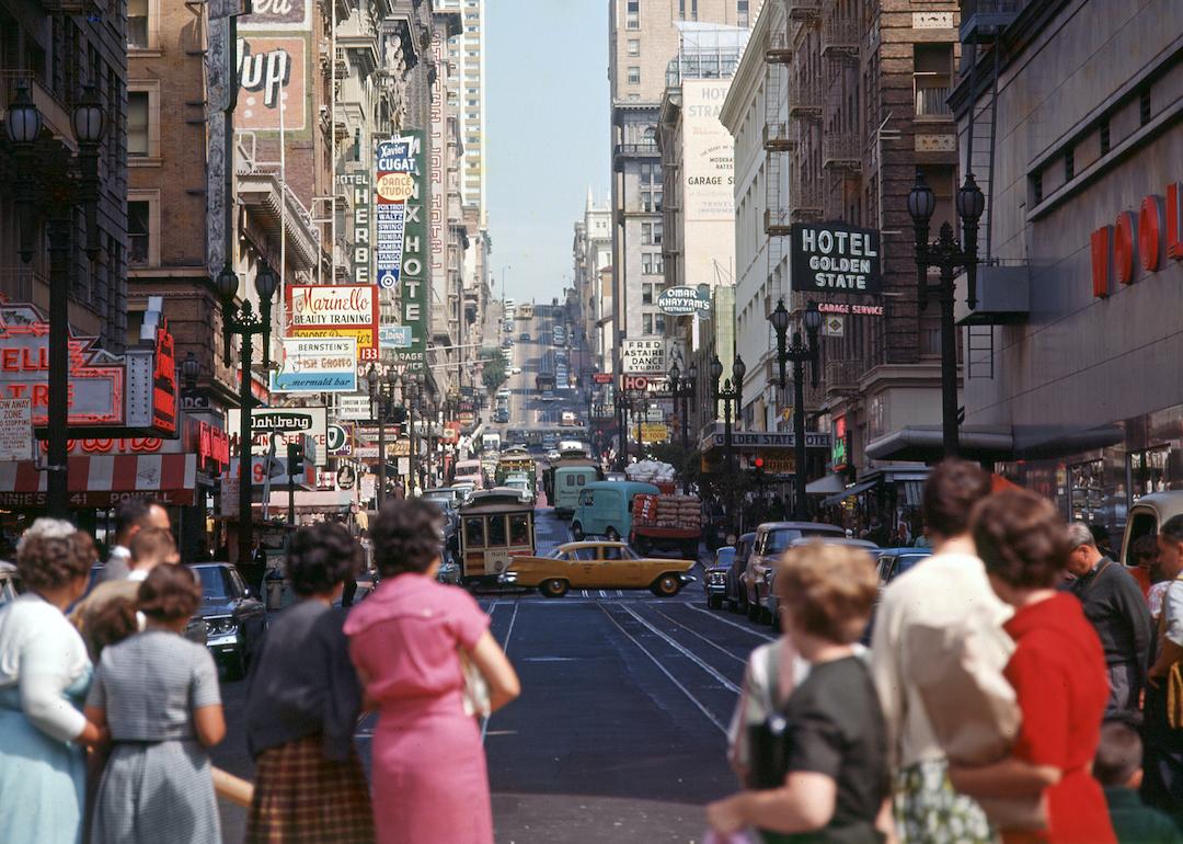 View, looking north, along Powell Street (at the intersection with Market Street) in the Tenderloin District, San Francisco, California, in the 1960s.
