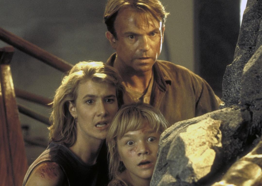 Sam Neill as Dr. Alan Grant, Laura Dern as Dr. Ellie Sattler, and Ariana Richards as Lex in a scene from the 1993 action movie "Jurassic Park."