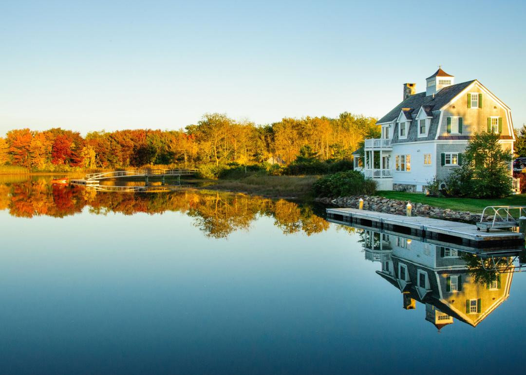 Lake house on the water near Kennebunkport, Maine in the fall.