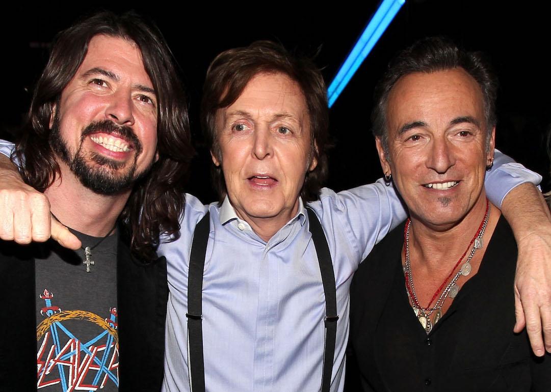 Musicians Dave Grohl, Sir Paul McCartney, and Bruce Springsteen at the 54th Annual Grammy Awards Media Center at Staples Center in Los Angeles, California.