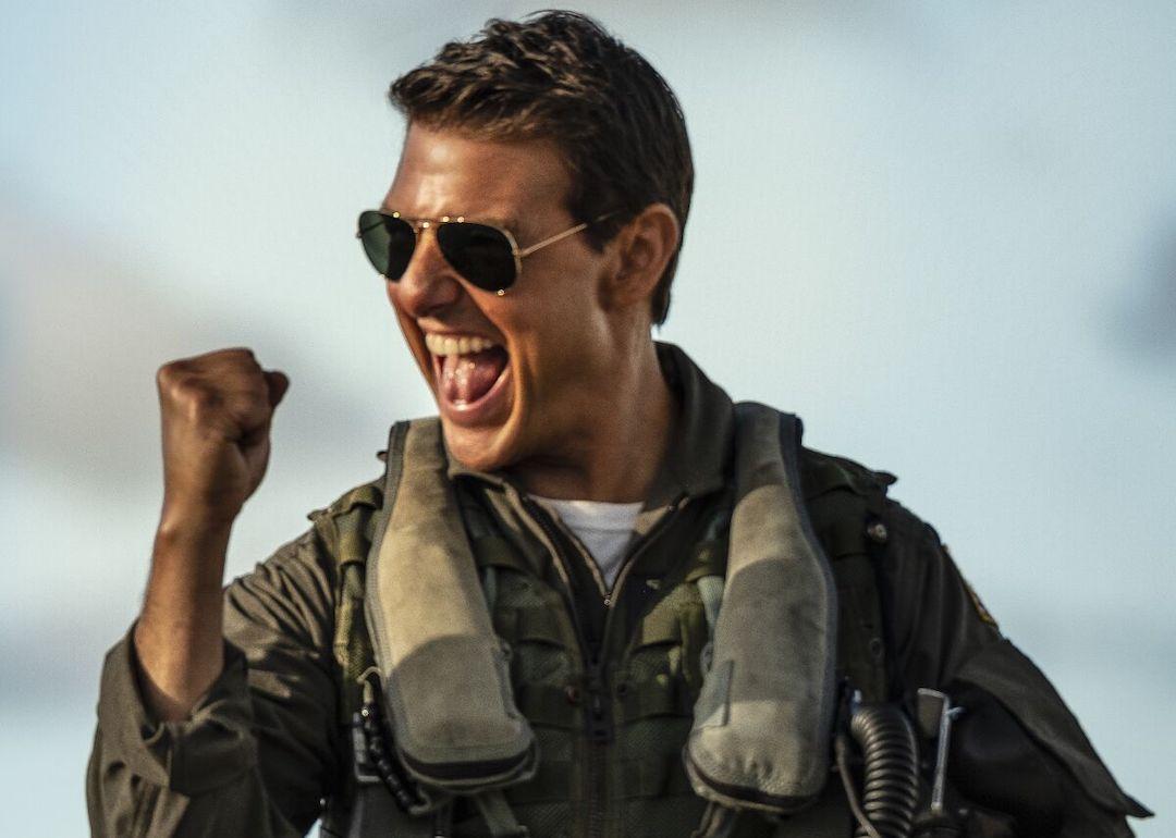 Tom Cruise in uniform and aviator sunglasses in 'Top Gun: Maverick.'