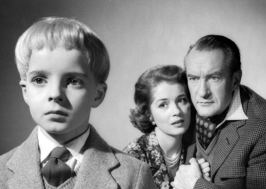 Actors Martin Stephens, Barbara Shelley, and George Sanders in the original 1960 'Village of the Damned.'