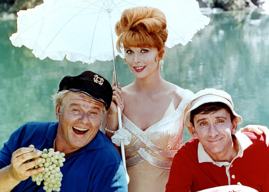 Alan Hale Jr. as The Skipper, Tina Louise as Ginger Grant, and Bob Denver as Gilligan in the television series 'Gilligan's Island', circa 1964.
