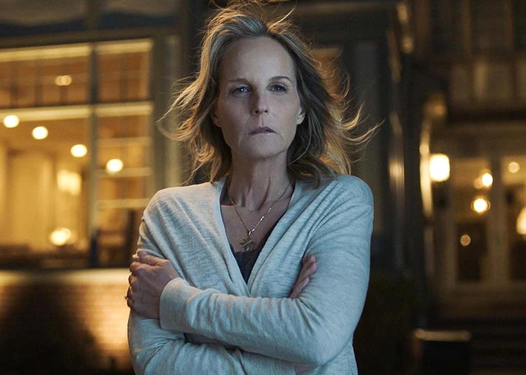 Actor Helen Hunt crosses her arms and looks scared in the 2019 movie 'I See You,' which is currently trending on Netflix.