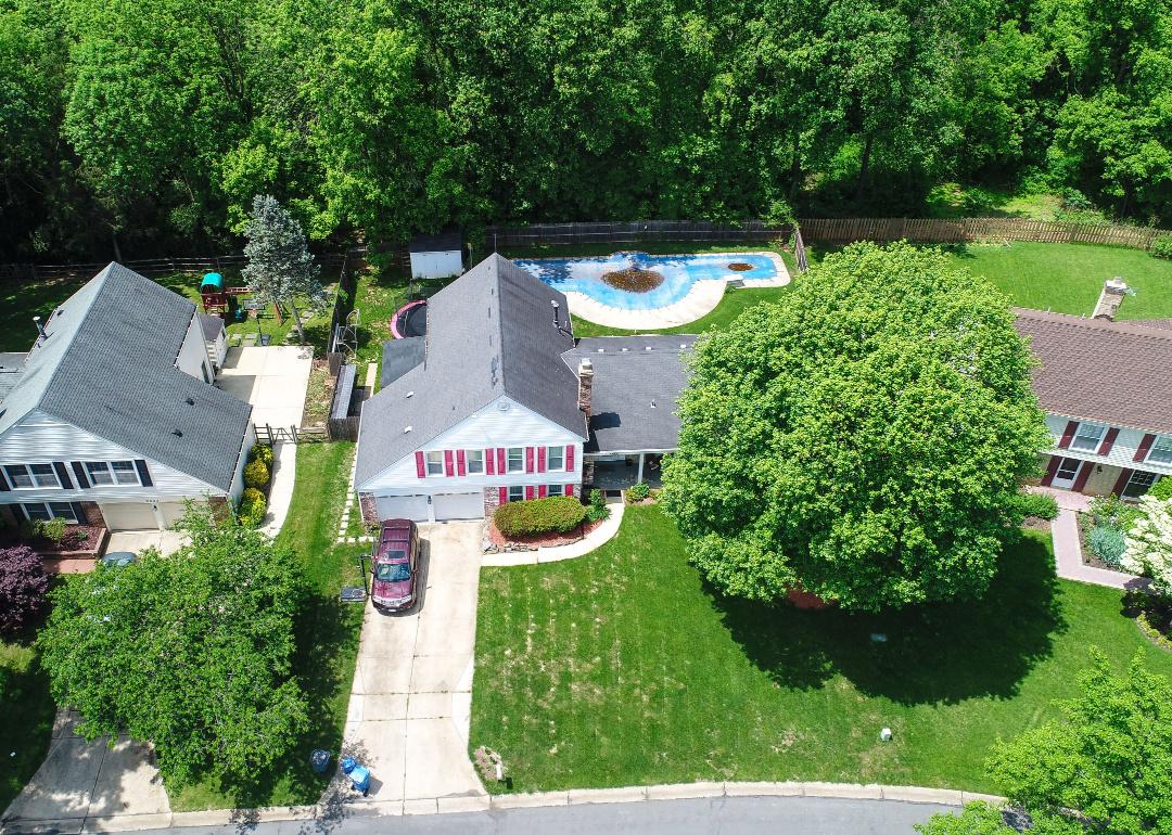 Three houses photographed from above in North Potomac, Maryland.