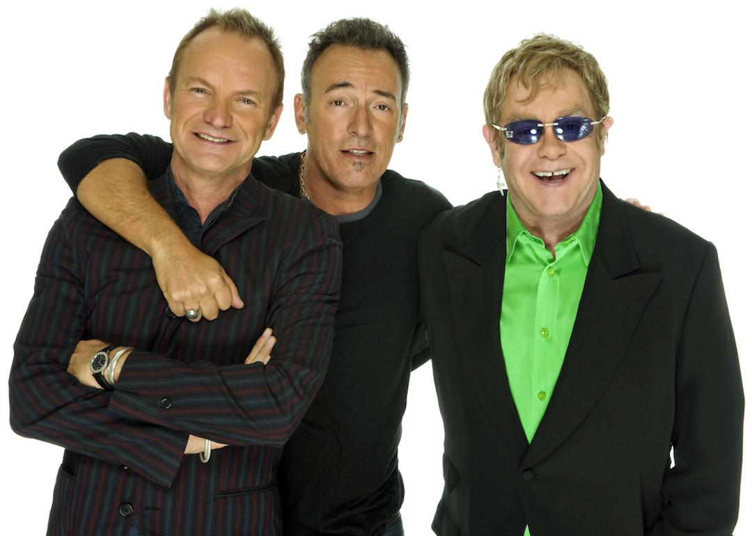 Sting, Bruce Springsteen, and Elton John pose for a portrait before the Almay concert to celebrate the Rainforest Fund's 21st birthday at Carnegie Hall on May 13, 2010 in New York City.