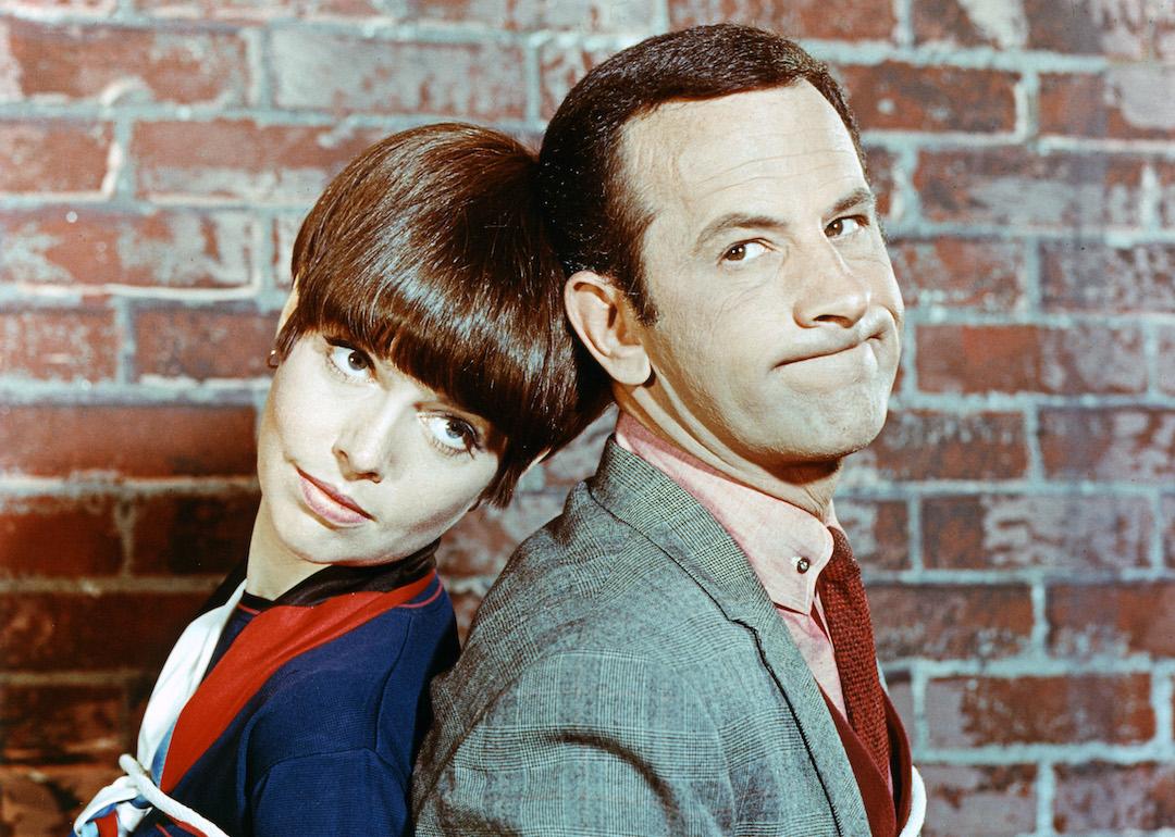 Actors Don Adams as Maxwell Smart/Agent 86 and Barbara Feldon as Agent 99 in the television series 'Get Smart,' circa 1965. 