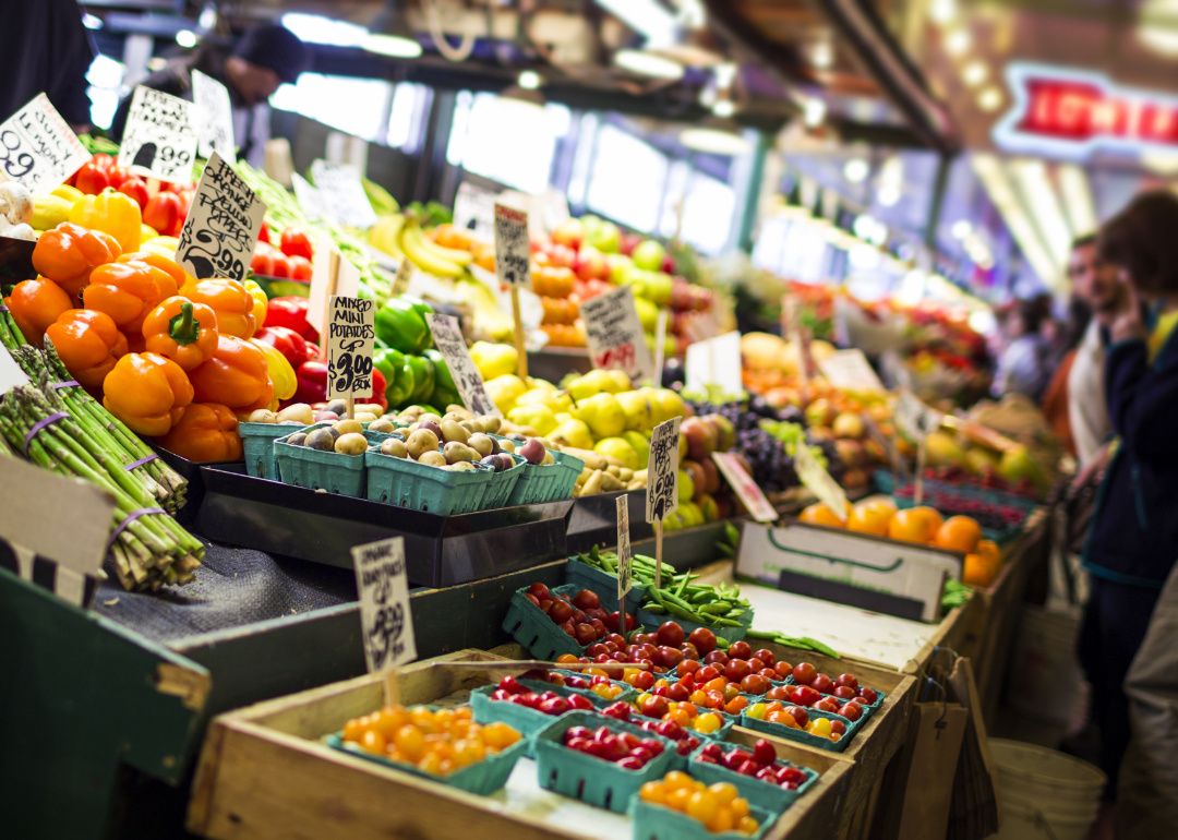 A variety of fresh looking fruits and vegetables on display at a market.