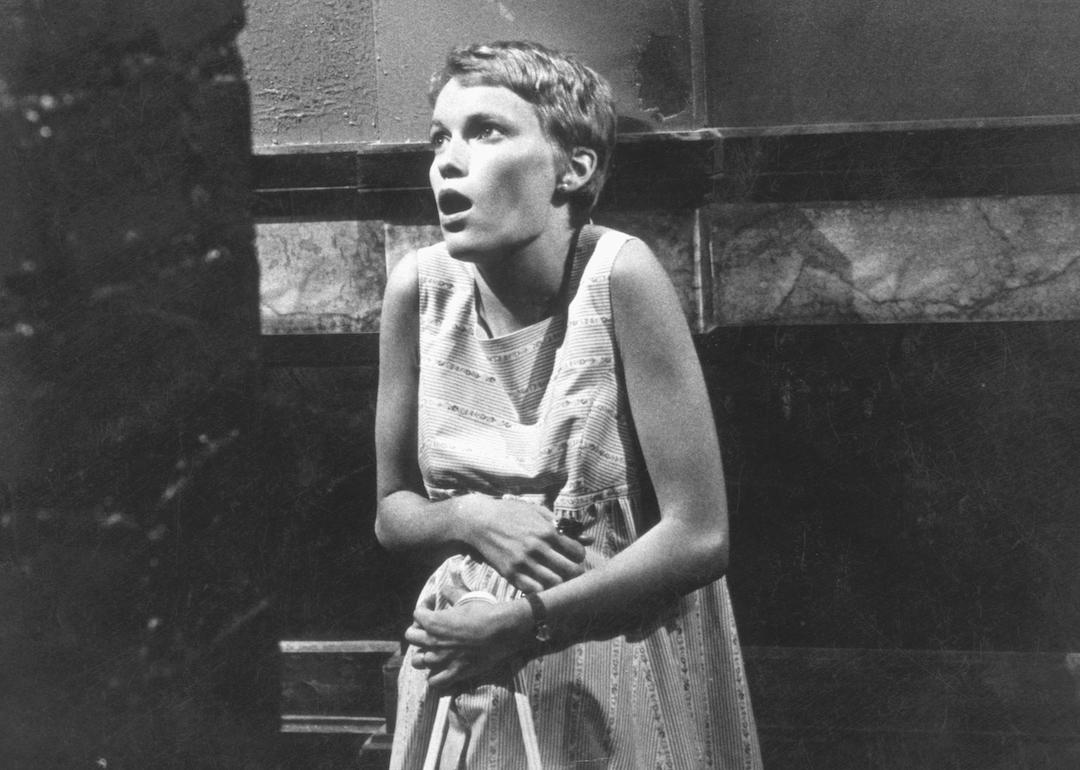 Actor Mia Farrow as Rosemary clutches her pregnant stomach in a scene from the 1968 horror movie 'Rosemary's Baby.'