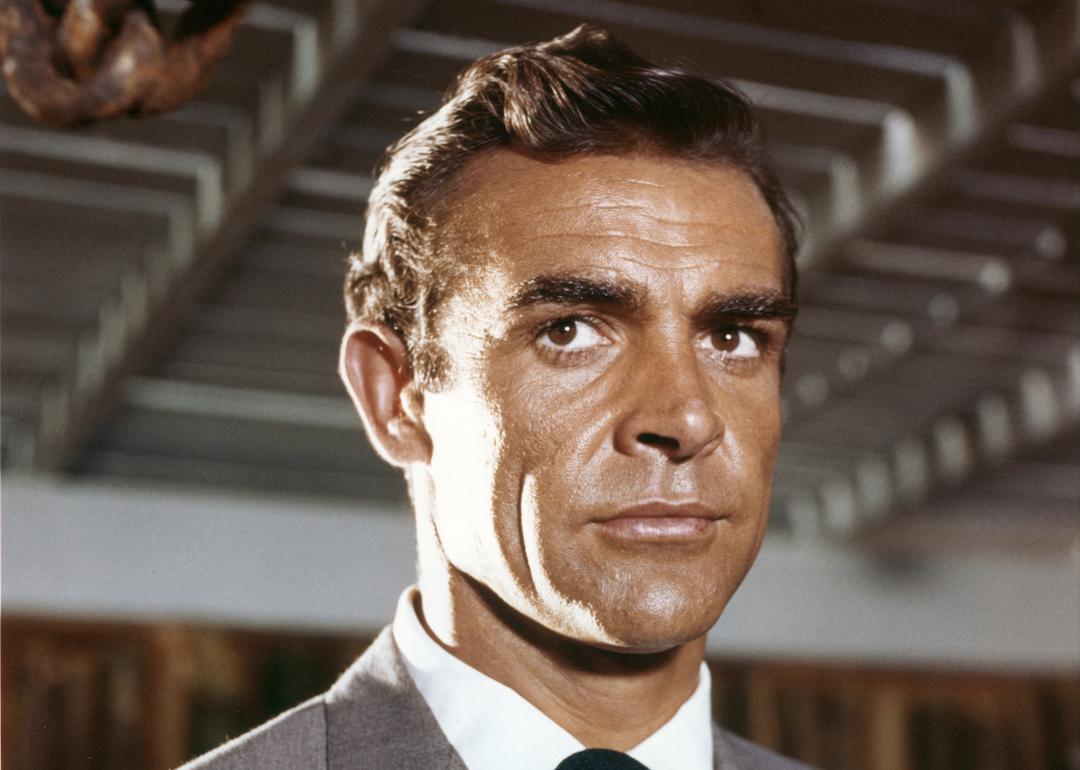 Sean Connery wearing a gray suit as James Bond in 'Dr. No.'