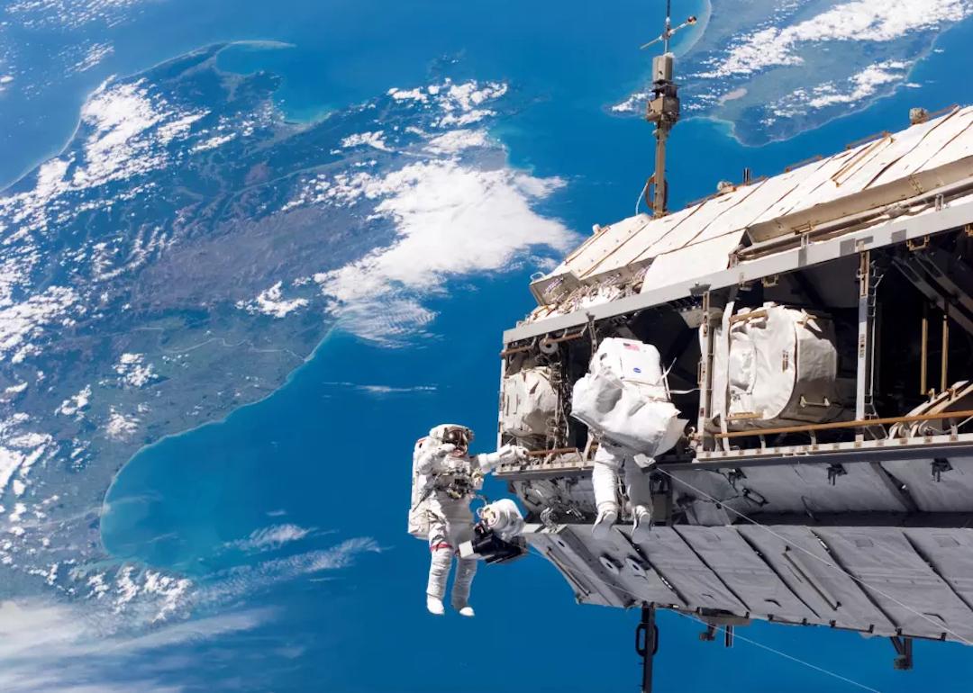NASA astronaut Robert L. Curbeam Jr. and European Space Agency astronaut Christer Fuglesang continue construction on the International Space Station (ISS).