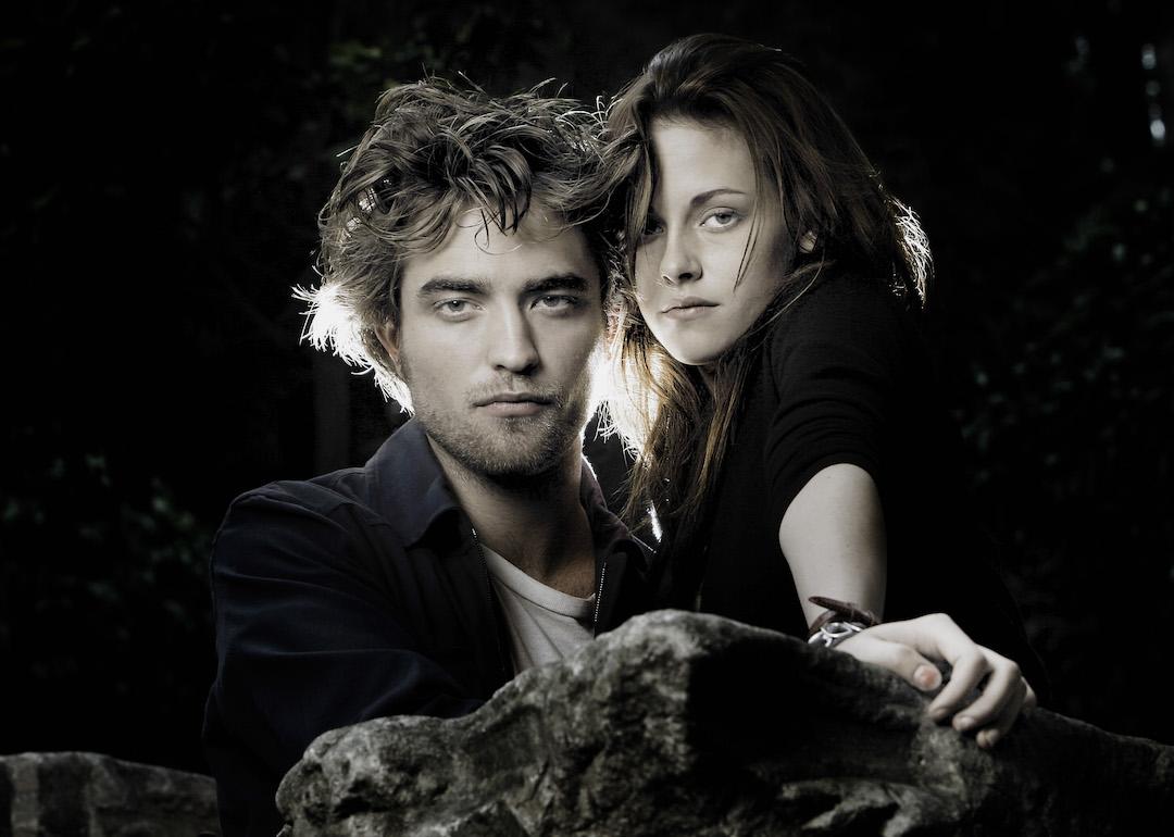 Actors Robert Pattinson and Kristen Stewart pose for a portrait promoting the 2008 movie 'Twilight.'