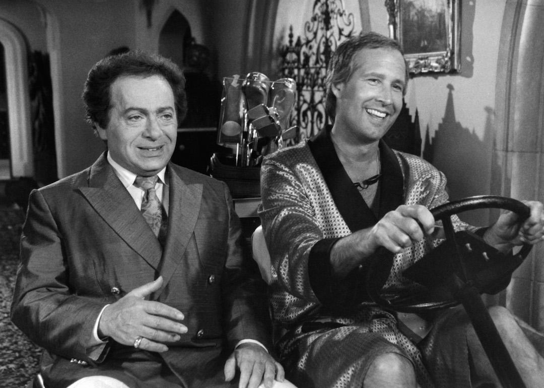 Actors Jackie Mason and Chevy Chase on set of the 1988 movie 'Caddyshack II.'