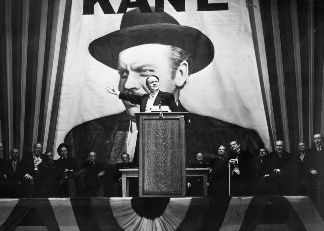 Charles Foster Kane (Orson Welles) makes a stirring campaign speech before a larger-than-life portrait of himself in a scene from "Citizen Kane"