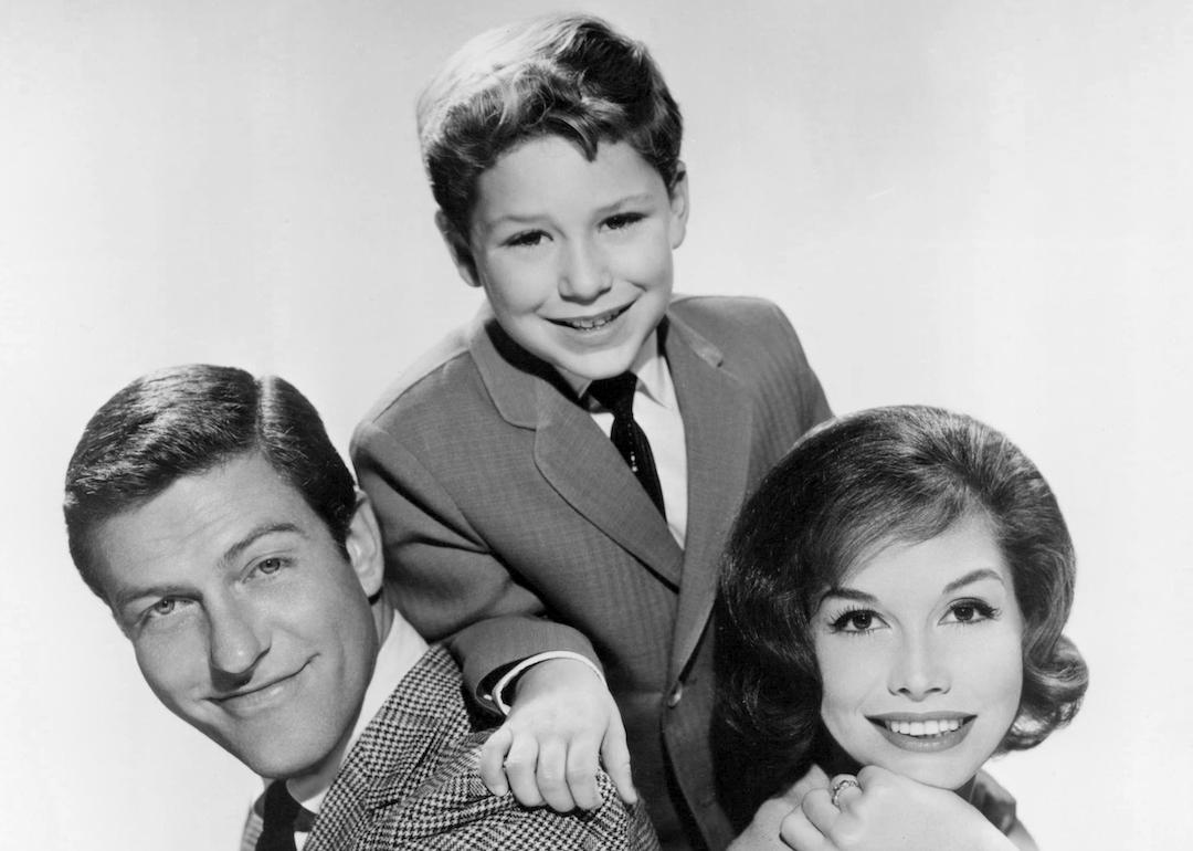 Actors Dick Van Dyke, Larry Mathews, and Mary Tyler Moore, in a promotional portrait for 'The Dick Van Dyke Show', circa 1965.