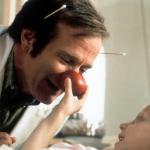 Robin Williams visits a sick child in a scene from the 1998 film 'Patch Adams.'
